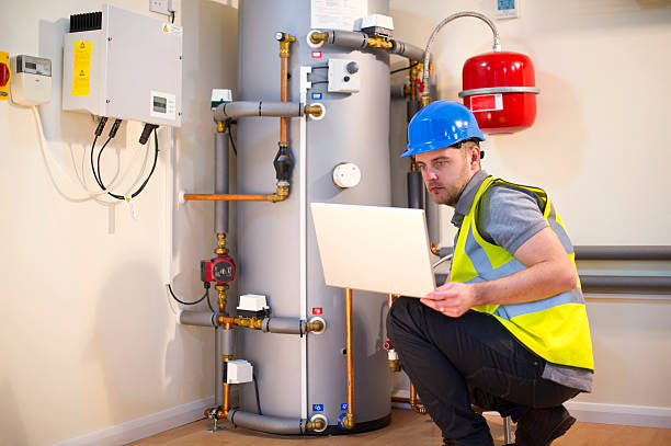 engineer checks solar pv control panel engineer checks solar pv control panel